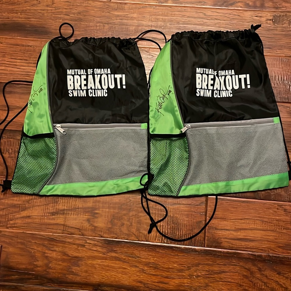 2 Breakout Swim Sacks Autographed by Multi Olympic Gold Medalist Katie Ledecky.